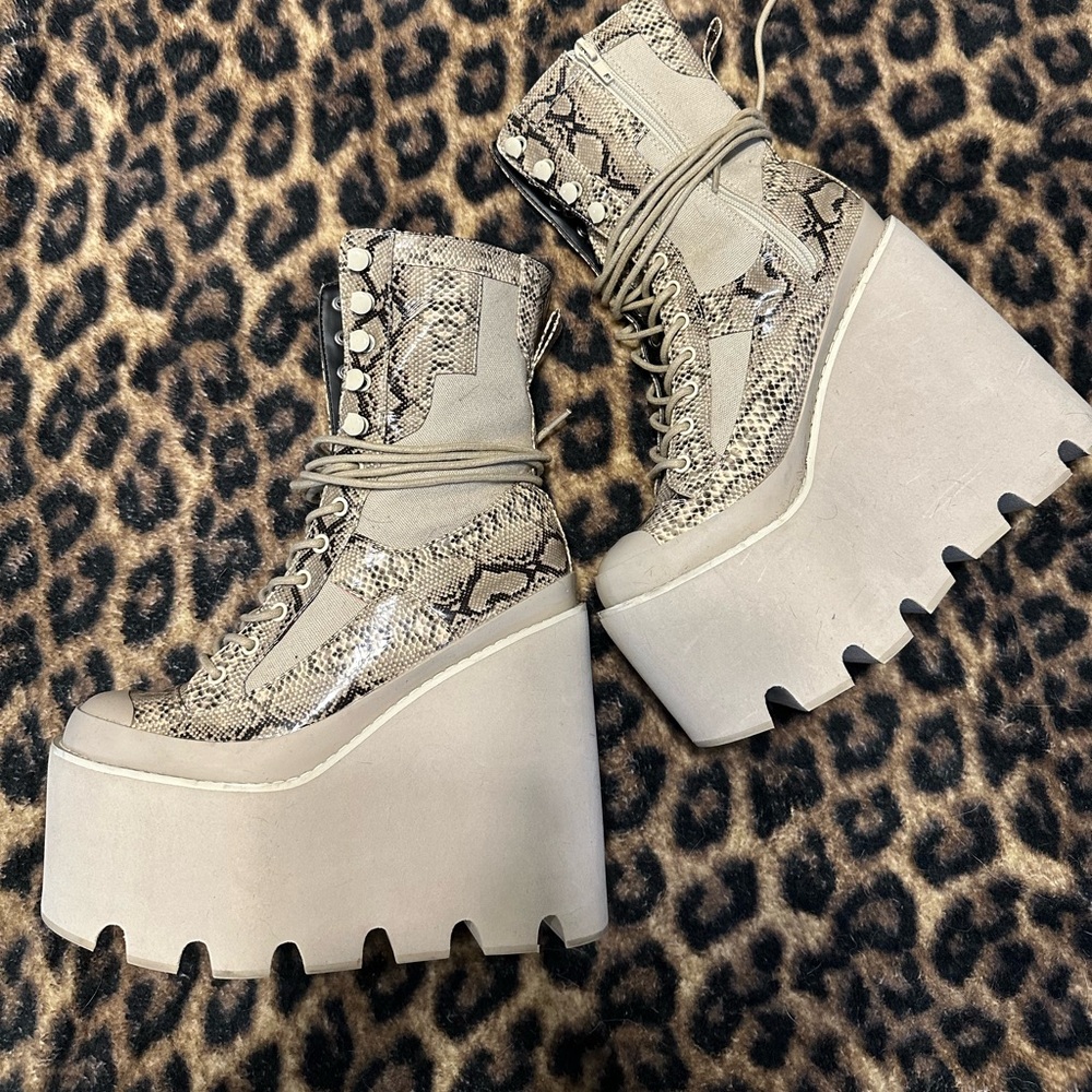 Snake print traitor boots